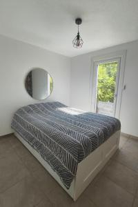 Postel nebo postele na pokoji v ubytování L'élégant