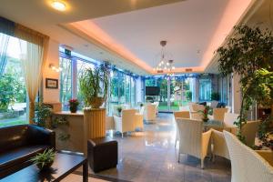 Posezení v ubytování Ambassador Suite Hotel