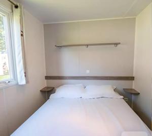 Postel nebo postele na pokoji v ubytování Mobil home 3ch