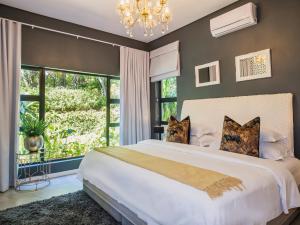 Postel nebo postele na pokoji v ubytování Eden Rock Luxury Villas, Pennington + 98 fotografií