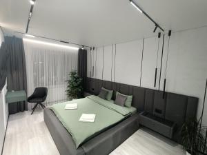 Posezení v ubytování Сучасний люкс з панорамним виглядом!