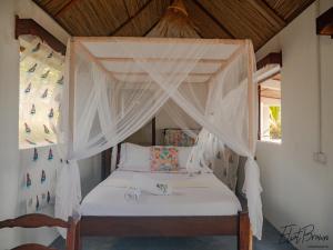 Postel nebo postele na pokoji v ubytování Mora Mora Resort