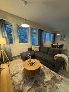 Posezení v ubytování Pramea Apartments Tourula + 10 fotografií