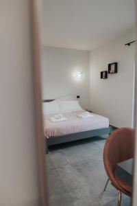 Una cama o camas en una habitación de B&B Lilà