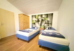 Ένα ή περισσότερα κρεβάτια σε δωμάτιο στο Modern appartement voor 2 personen In Friedeburg - 79-5