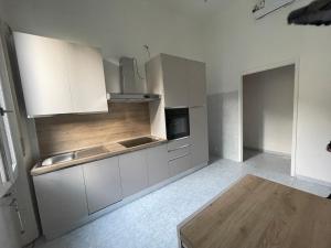 Kuchyň nebo kuchyňský kout v ubytování Rosa