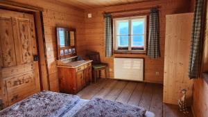 Ένα ή περισσότερα κρεβάτια σε δωμάτιο στο Ferienhaus Eckstoa