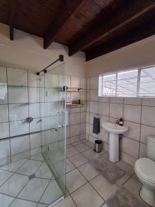 Et badeværelse på Figtree Escape + 22 billeder