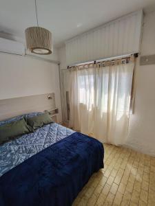 Postel nebo postele na pokoji v ubytování Toninas Relax