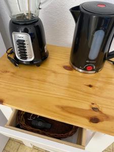Příslušenství pro přípravu čaje a kávy v ubytování Toninas Relax
