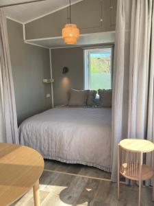Ένα ή περισσότερα κρεβάτια σε δωμάτιο στο Kirkjuholt Guesthouse, 7