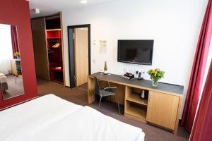 Μια τηλεόραση ή/και κέντρο ψυχαγωγίας στο Hotel Kloster Eberbach