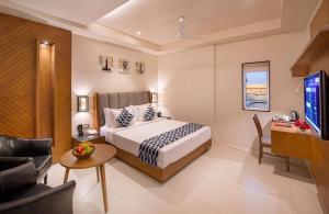 Postel nebo postele na pokoji v ubytování Hotel Tara International Near Delhi Airport