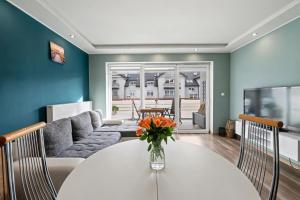 Posezení v ubytování DreamHouse Apartament Zefir Północna 18B, Darłówko Wschodnie