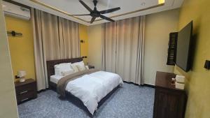 Ένα ή περισσότερα κρεβάτια σε δωμάτιο στο Burrow 99 Lounge