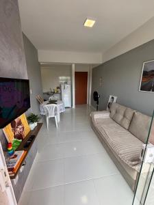 Posezení v ubytování Apartamento Completo com piscina e play infantil + 38 fotografií