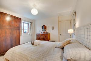 En eller flere senge i et værelse på Nyth y Wennol