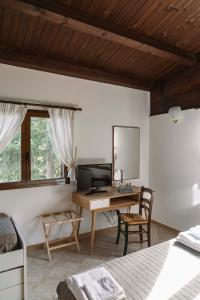 TV a/nebo společenská místnost v ubytování B&B Villa Adriana