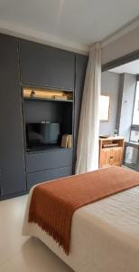 En eller flere senge i et værelse på Studio próx metrô Oscar Freire