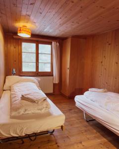 Postel nebo postele na pokoji v ubytování Chalet Brauerei