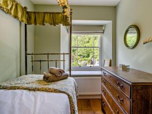 Ένα ή περισσότερα κρεβάτια σε δωμάτιο στο 4 Bed in Hay-on-Wye Town BN116