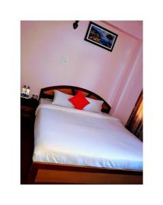 Ένα ή περισσότερα κρεβάτια σε δωμάτιο στο Hills's View Guest House Narkanda