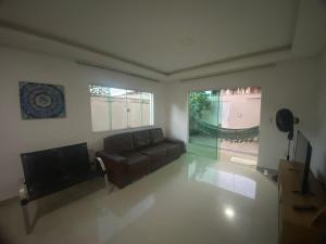 Istumisnurk majutusasutuses Requinte e Conforto em Guarapari