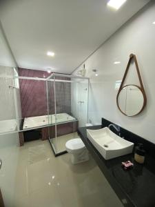 Vannituba majutusasutuses Requinte e Conforto em Guarapari