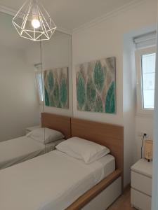 Postel nebo postele na pokoji v ubytování Ático Marila + 12 fotografií