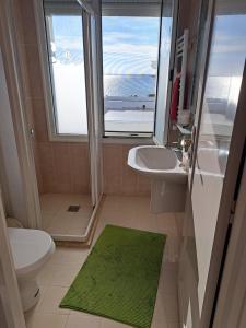 Koupelna v ubytování Appart Kelibia View Sea + 22 fotografií