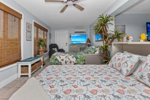 Ένα ή περισσότερα κρεβάτια σε δωμάτιο στο Blue Paradise - 7 DAY MINIMUM STAY +100 φωτογραφίες