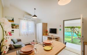 a living room with a table and a couch at Villa Mir - Rovinj by Villas Guide in Štanga