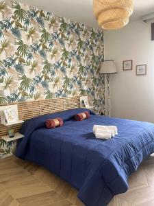 Giường trong phòng chung tại B&B La Rotonda