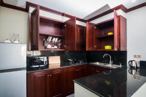 Kuchyň nebo kuchyňský kout v ubytování Anachak Angkor Suite + 3 fotografie