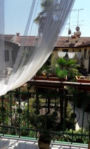a view of a garden from a balcony at Casaldo in Gardone Riviera