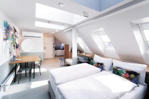 Ένα ή περισσότερα κρεβάτια σε δωμάτιο στο Sorell Boutique-Hotel City Weissenstein St Gallen +29 φωτογραφίες