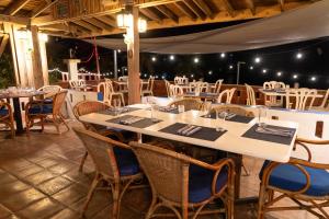 Restaurace v ubytování Trade Winds Restaurant & Guest House + 33 fotografií