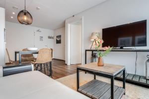 TV a/nebo společenská místnost v ubytování Badhotel Bruin