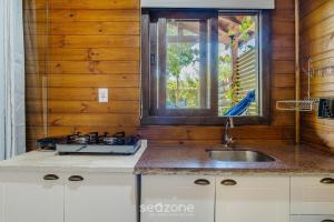 Billede fra billedgalleriet på Chalés Elegantes e Completos em Imbituba - REL i Praia do Rosa + 4 billeder