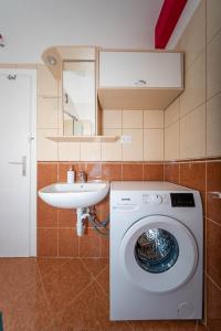 Koupelna v ubytování Apartmani Andreja