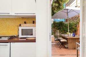 Køkken eller tekøkken på CasaSolemare Terrace seaview AC