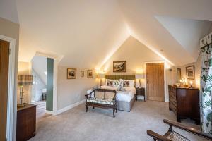 Postel nebo postele na pokoji v ubytování Lundin Farmhouse - Seasgair Lodges