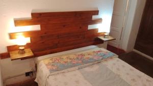 Postel nebo postele na pokoji v ubytování Algarrobo + 2 fotografie