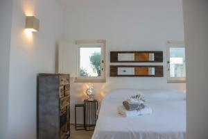 Postel nebo postele na pokoji v ubytování TD Trulli Balice Cozy Trulli with Pool