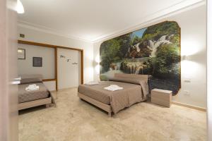 Ένα ή περισσότερα κρεβάτια σε δωμάτιο στο B&B Storie di famiglia +21 φωτογραφίες