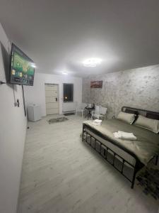 En eller flere senge i et værelse på Rinn Residence + 32 billeder