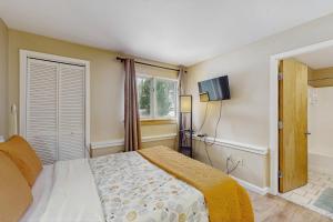 Ένα ή περισσότερα κρεβάτια σε δωμάτιο στο The Woods - Village 4 +26 φωτογραφίες