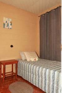 Ένα ή περισσότερα κρεβάτια σε δωμάτιο στο Las Palmeritas