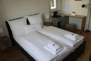 Ένα ή περισσότερα κρεβάτια σε δωμάτιο στο Zimmer im Zentrum von Paderborn