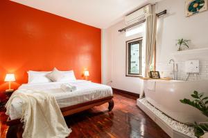 Postel nebo postele na pokoji v ubytování BlueHome 202